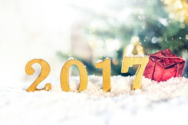 istock Golden 2017 figures in the snow 628245994