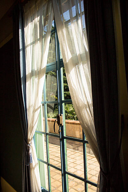 istock Terrace door with summer curtain 628249308