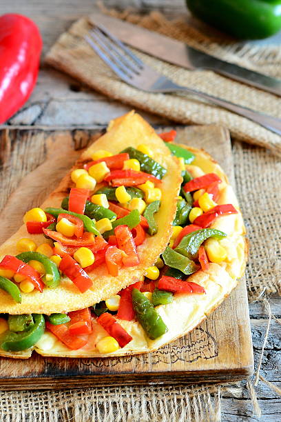 istock Vegetable omelet on a wooden board 628262792