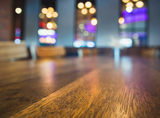 istock Table top Bar seats Blurred colourful lighting background Party 628263296