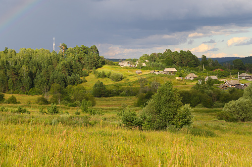 Russian village among woods.  The village is called as Julovo.
