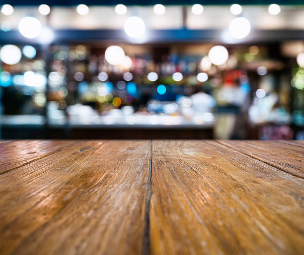 istock Table top Counter Blur Bar Restaurant Pub Lighting decoration Background 628276054