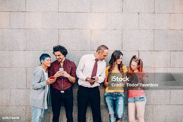 Texting At Different Ages Stock Photo - Download Image Now - Variation, Individuality, Family