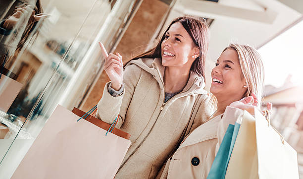 istock Two beautiful women in shopping 628280516