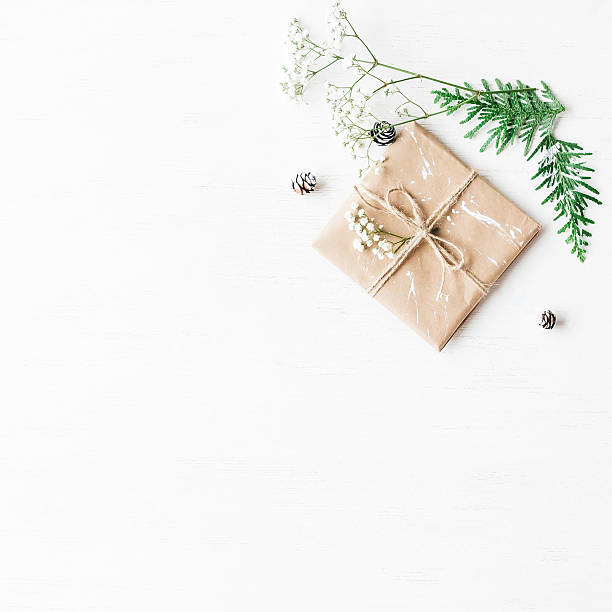 istock Christmas gift, thuja branches, pine cones and gypsophila flowers 628288312
