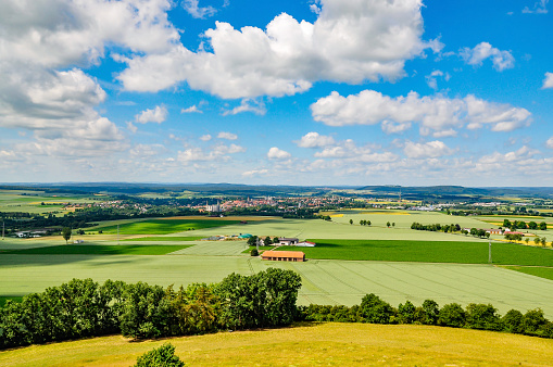 panoramic view from desenberg over cornfields and meadows at warburg, germany