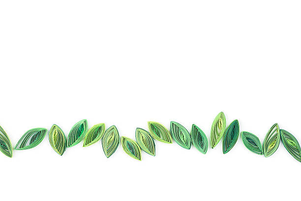 leaves made quilling on a light background leaves made quilling on a light background. paper quilling stock pictures, royalty-free photos & images
