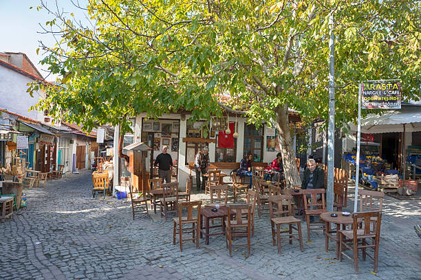 Bergama, Turkey - November 23, 2016: Traditional Turkish coffeehouse in the old marketplace of old town of Bergama, Izmir, Turkey. Local people are sitting in the coffeehouse.