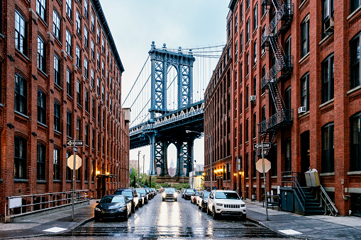 Sunny morning at the Brooklyn Bridge looking into Manhattan with the Twin Towers, NY, USA