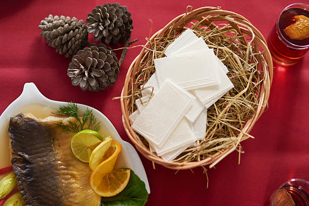 Traditional carp next to wafer in the basket