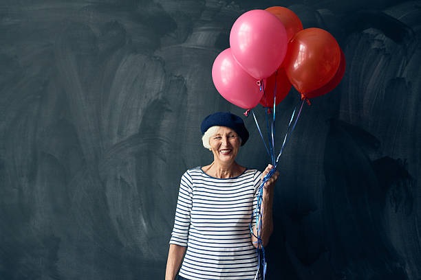 istock Joyful elderly woman in sailor shit 628304640