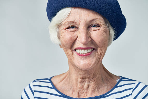 istock Cheerful senior woman with wide smile 628304750