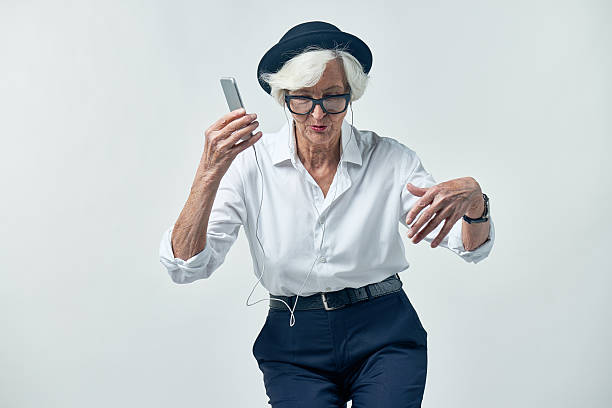 istock Senior woman dancing to favorite tune 628304822