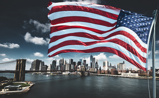 American flags waving on the lampposts of the Big Apple districts, as in the whole Manhattan of New York, in the United States of America.