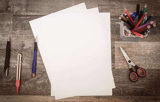 istock Flat lay - office equipment, several sheets of paper 628307958