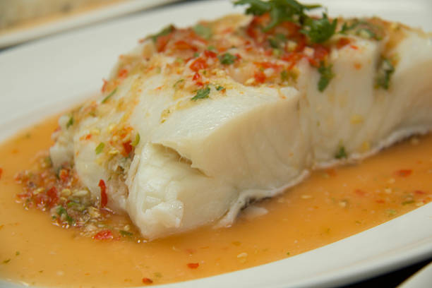 istock Steamed snow fish with spicy sauce 628310556