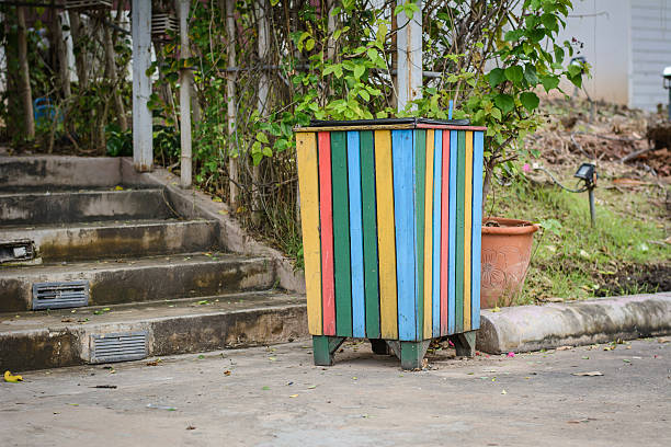 istock Colorful Wood Trash Bin in the park. 628310674