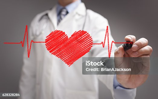 istock Doctor drawing ecg heartbeat chart 628328284