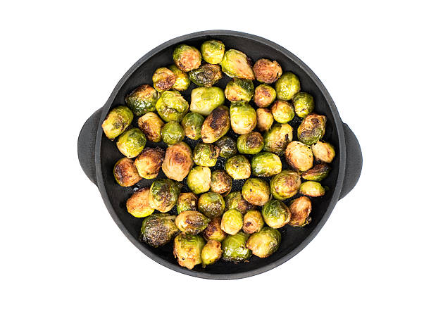 Fried brussels sprouts in a pan