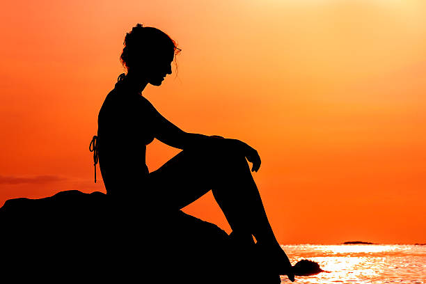 istock Woman at the sea 628335120