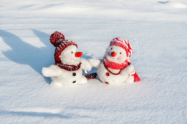 istock Couple of snowmen 628335358