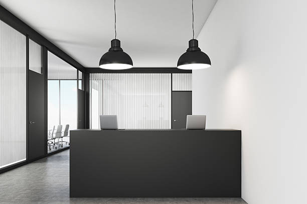 istock Close up of an office lobby with a reception counter 628345726
