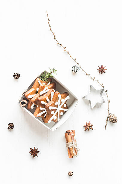 istock Gift, larch branches, cinnamon sticks, anise star, christmas cookies 628345822