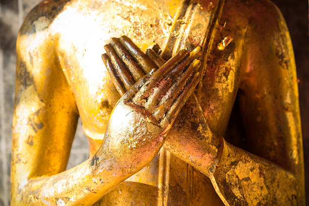 Close up hand of statue Buddha.buddhism concept