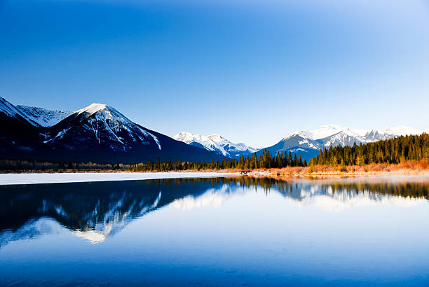 istock Vermilion Lake at Dawn in Winter, Canadian Rockies, Alberta, Canada 628347370