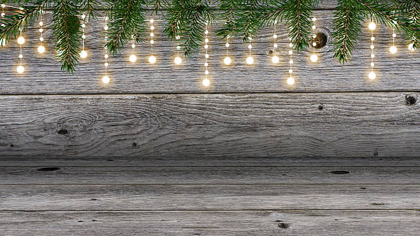 istock festive lights in grey wooden room 628349140