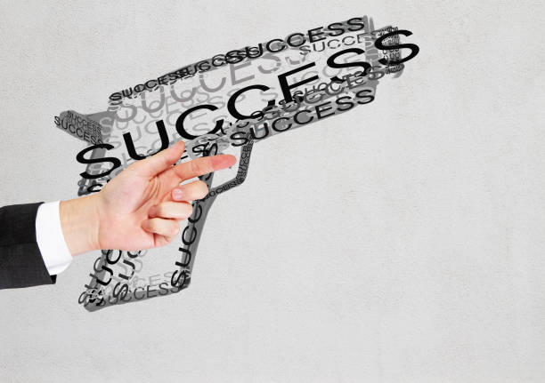istock Businessman with gun sketch 628349618