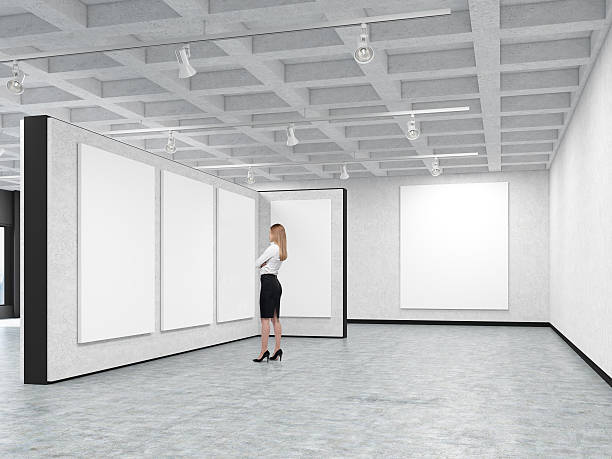 istock Woman is looking at a blank picture 628349736