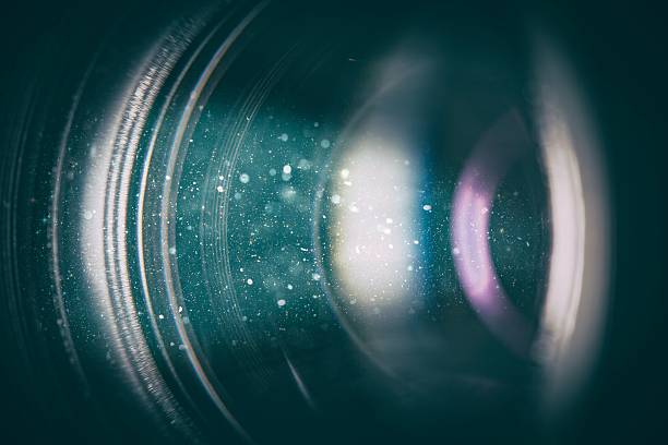 Camera lens with lense reflections. flare lens camera background macro light flash real bright film focus performance dust black optical color glowing concept - stock image telephoto lens stock pictures, royalty-free photos & images