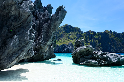 jagged karst limestone rock formations around the bays of el nido in palawn the philippines