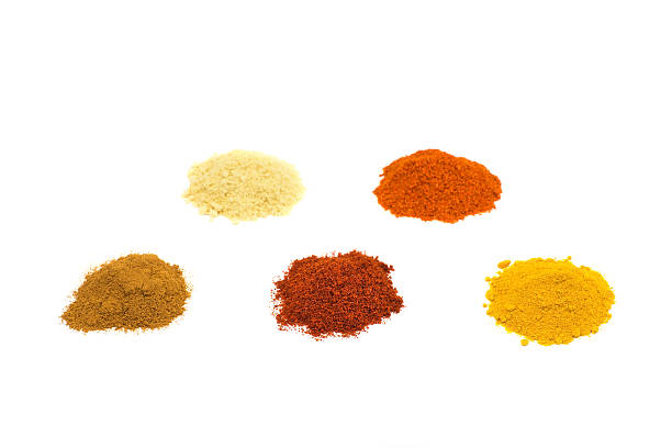 istock Heaps of several seasoning spices on white 628356716