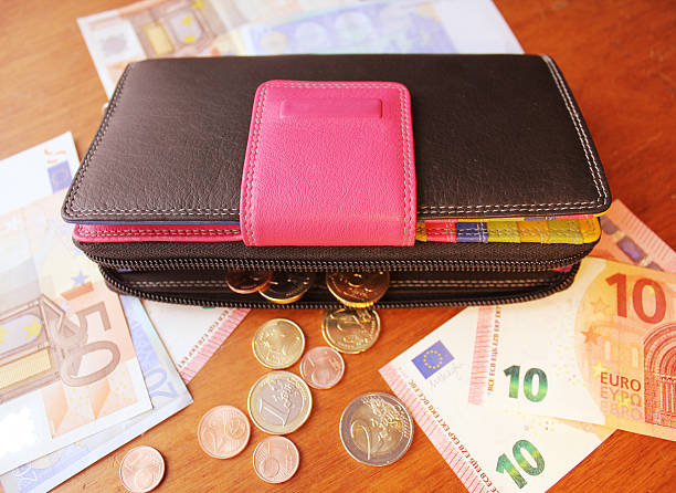 istock leather wallet and money euro on table 628358374