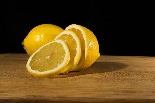 istock Group of fresh lemon cut on wooden table fruit, nature 628359410