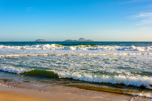 The sea, islands and horizon of Leblon beach in Rio de Janeiro