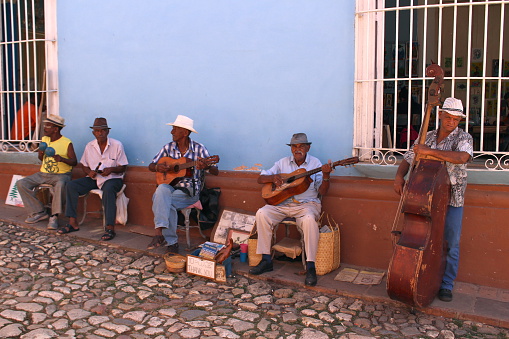 Trinidad, Cuba - November 8, 2016: Musicians play on the street