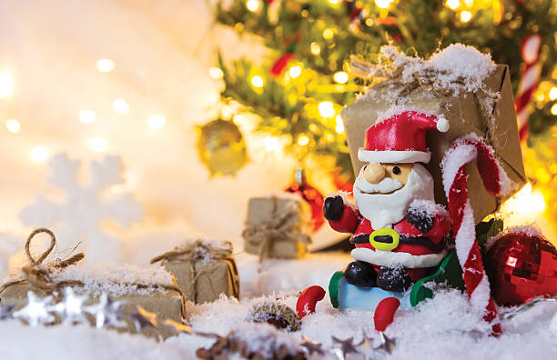 istock Christmas decoration santa claus and gift box 628361606