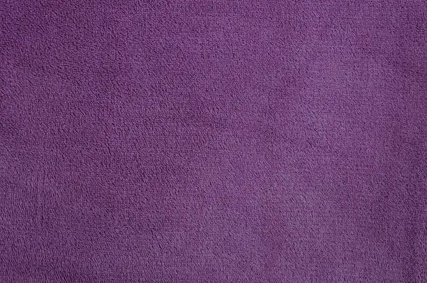 Photo of Violet texture of nap textile
