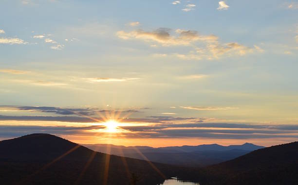istock Sunset over mountains and lake, Vermont 628367576