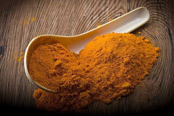 istock dust of ground turmeric 628388304