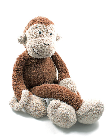 Sweet monkey toy sitting