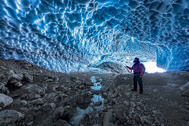 istock Hiker in ice cave,  Bavarian Alps - Berchtesgaden National Park 628389000