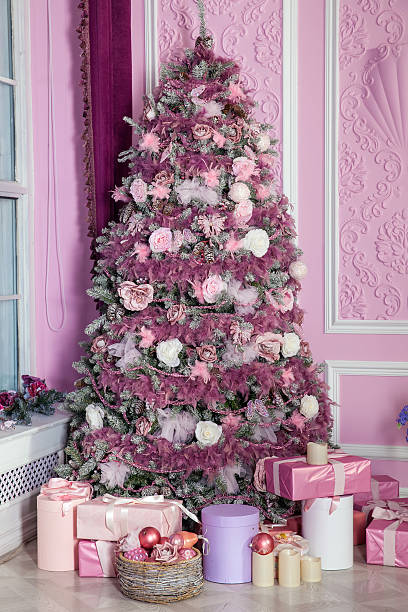 istock New Year tree decorated in pink toys 628389810