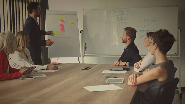 istock Group of business people in office. 628390438