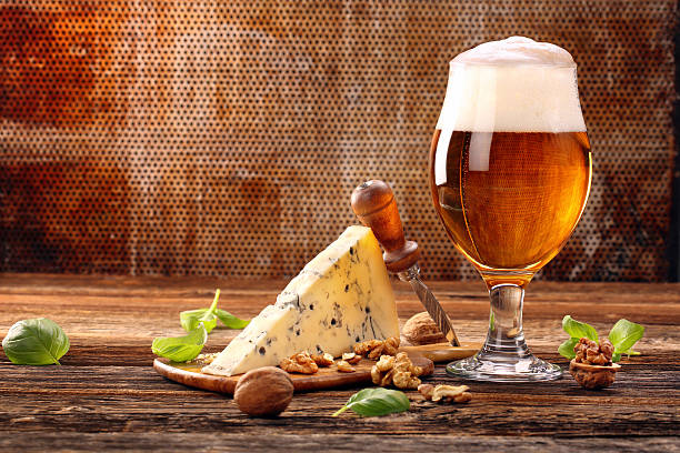 istock Blue cheese appetizer and beer on brown vintage background 628390818