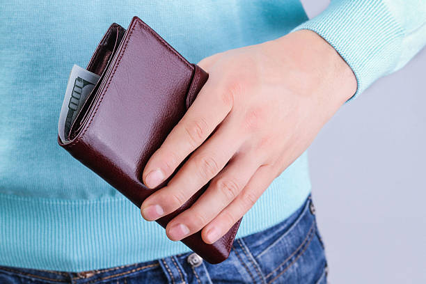 istock Purse with money in hand 628390940