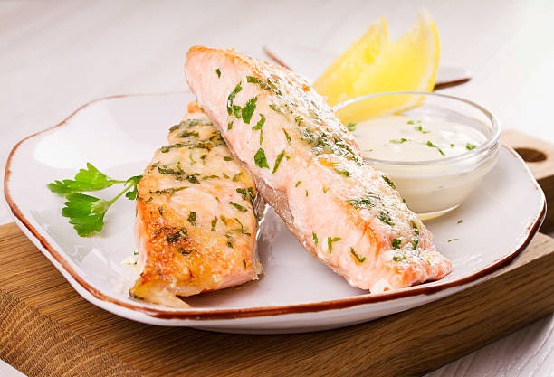 istock Baked salmon with parmesan and herbs 628399862
